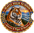 A circular school emblem for Haysi High School featuring a detailed illustration of a tiger resting in a mountain landscape at sunrise. The design has a gold border, red outer ring with gold lettering reading 'HAYSI HIGH SCHOOL' and 'Always A Tiger At Heart', and blue inner details.